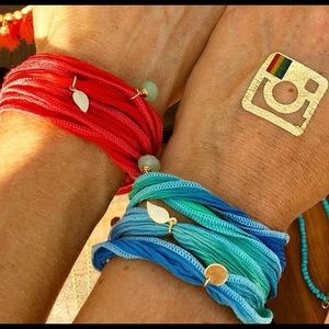 Two Silk wrap charm bracelets